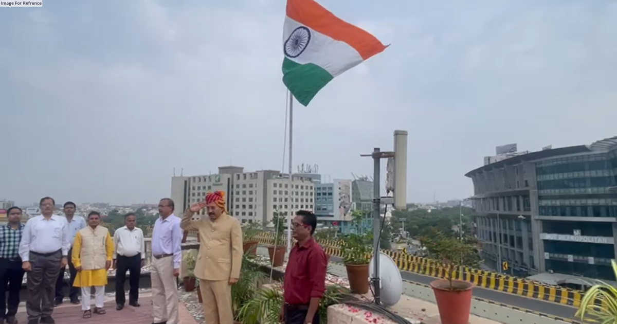 Registrar of cooperative societies hoists National Flag at Nehru Sahakar Bhawan
